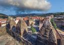 View from the top of the collegiate church and the town of Salas with battlements in the foreground