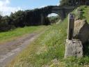 Cyclist under bridge on strategic railway greenway