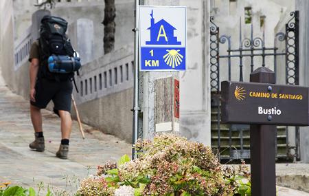 Pilgrim on his way through Bustio in Ribadedeva