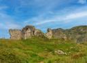 Ruins of the hermitage of San Martin on a green meadow