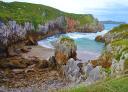 Rocky cove of San Martín in Celorio surrounded by cliffs.