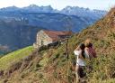 Hikers observing the Picos de Europa from Rozagas