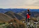 Hiker contemplating the Cantabrian mountain range from Xamoca
