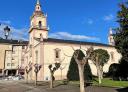 Church of Nuestra Señora de la Asunción in the tree-lined square of Vegadeo