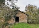 Stone shelter in the middle of the forest
