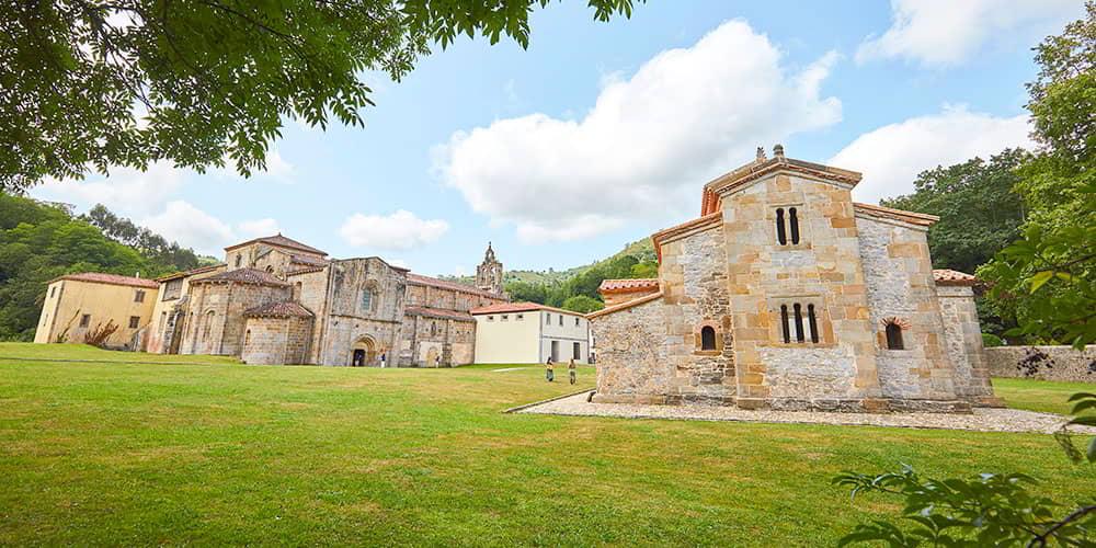 Panoramic view of the monumental complex of Valdediós, showing the church of San Salvador and the monastery of Santa María.