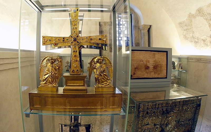 Relics from the Holy Chamber in Oviedo Cathedral, including the Cross of the Angels and the partially visible Holy Ark.