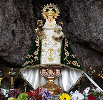 The Virgin of Covadonga and her mantles