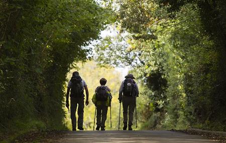Pilgrims in the vicinity of the Valdediós River in Villaviciosa