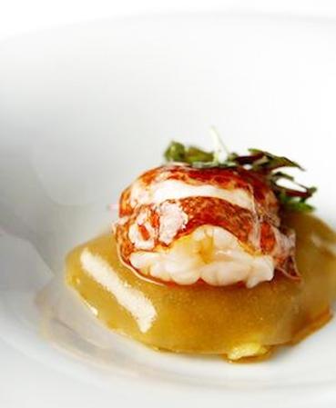 Go to Image Natural lobster on a veil of lobster juice and saffron risotto